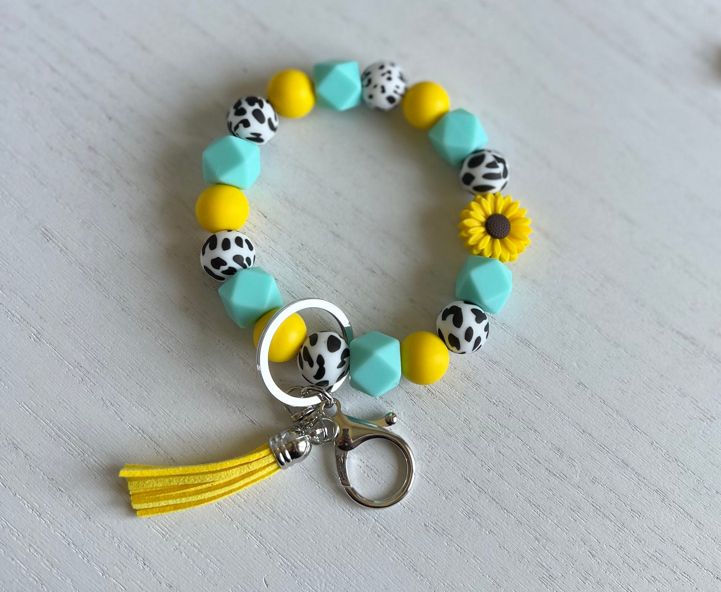 Cow, Teal & Yellow Wristlet